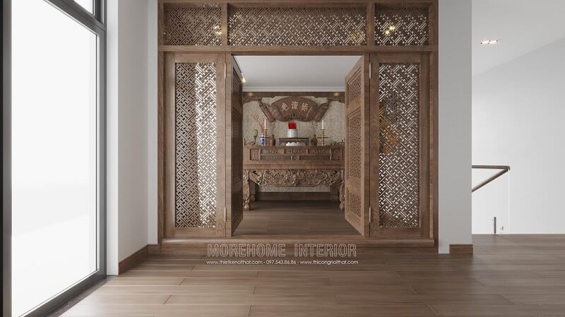 Phong thờ mang đậm phong cách tôn nghiêm với bàn thờ gia tiên làm bằng gỗ cao cấp màu nâu tây, được trang trí bằng những đường nét tinh tế làm nên sự cuốn hút mọi ánh nhìn.